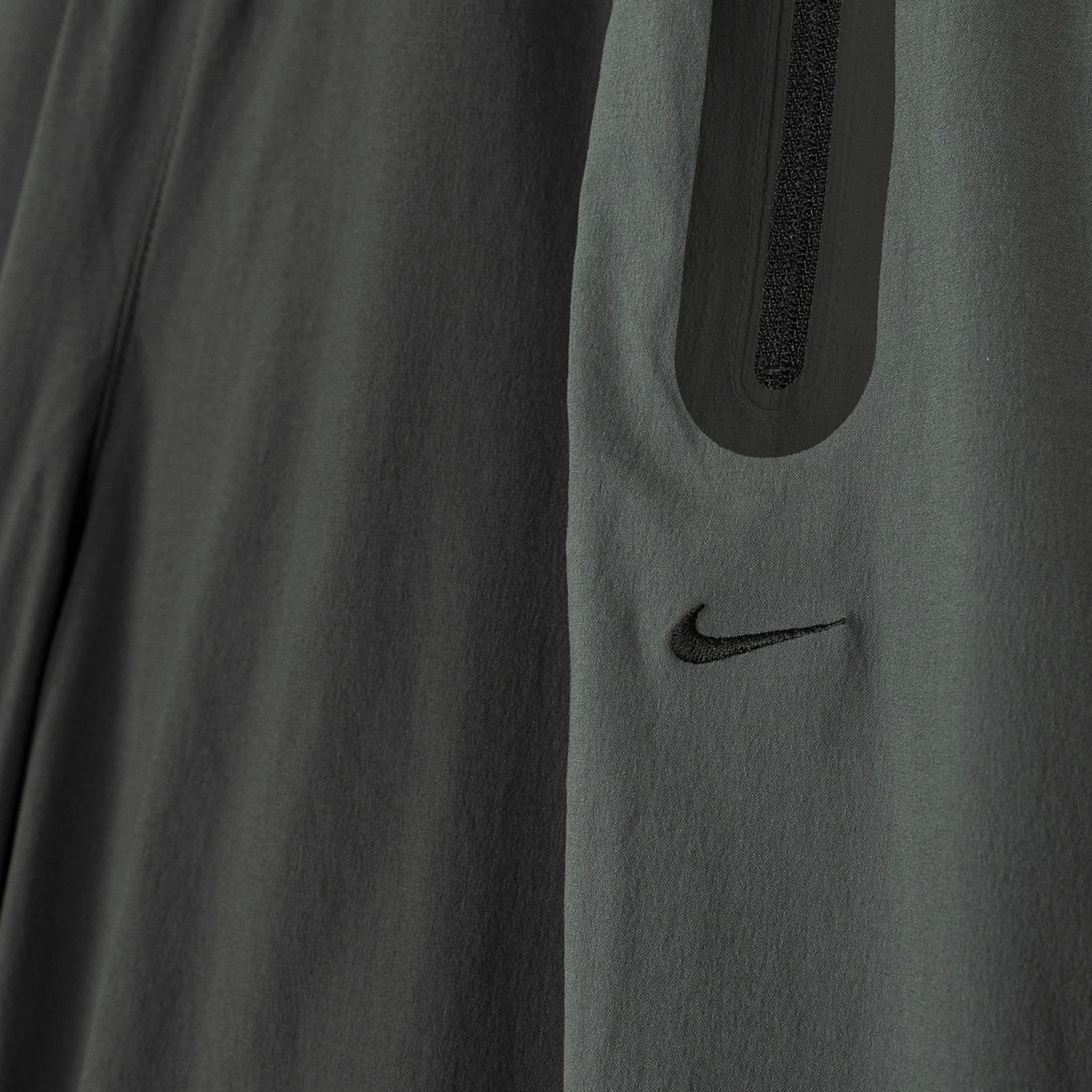Nike	Tech Dri-Fit Woven Color-Block Trousers - Image 15